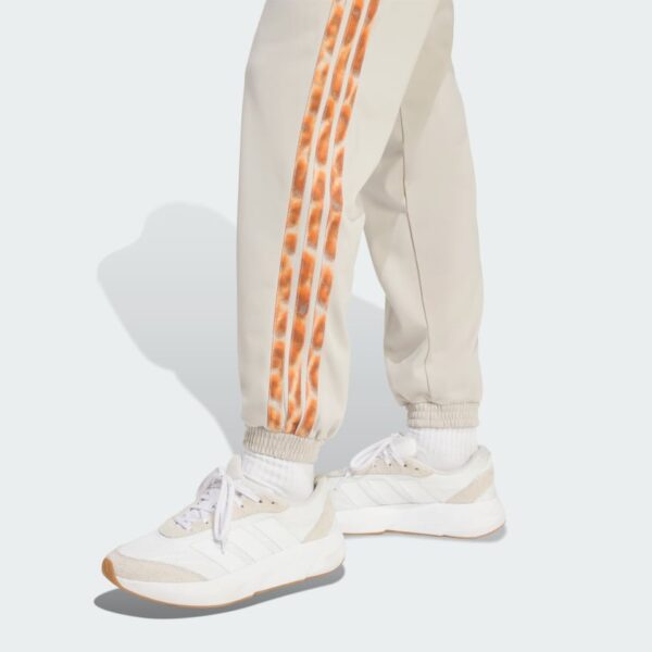 Tricot 3 Rayas Trackpants con Estampado Leopardo-