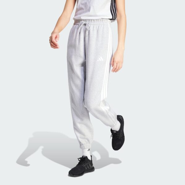 IN6178_000_plp_model.jpgIN6178_000_plp_model.jpg Pantalones holgados de vellón de 3 bandas Adidas Essentials para mujer-