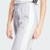 IN6178_41_detail.jpg Pantalones holgados de vellón de 3 bandas Adidas Essentials para mujer-
