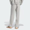 Pantalones de chándal sueltos de vellón Adidas Essentials para mujer-