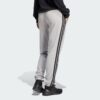 Pantalones con puños de felpa francesa Adidas Essentials de 3 bandas para mujer-
