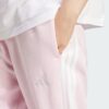 JE1272_41_detail.jpg Pantalones holgados de vellón de 3 bandas Adidas Essentials para mujer-