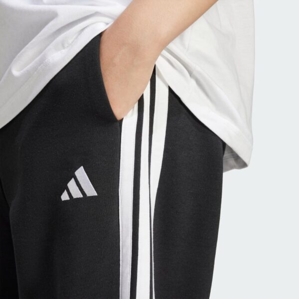 JE1276_41_detail.jpg Pantalones holgados de vellón de 3 bandas Adidas Essentials para mujer-