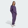 Pantalones de chándal sueltos de vellón Adidas Essentials para mujer-