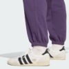 Pantalones de chándal sueltos de vellón Adidas Essentials para mujer-
