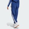 JX7696_23_hover_model.jpg Pantalones holgados de vellón de 3 bandas Adidas Essentials para mujer-