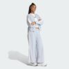 Pantalones de paracaídas tejidos estilo de vida Adidas Essentials 3 bandas para mujer-
