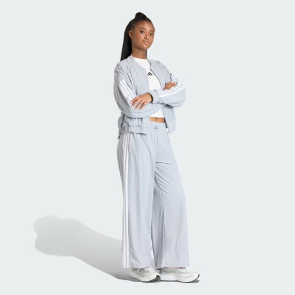 Pantalones de paracaídas tejidos estilo de vida Adidas Essentials 3 bandas para mujer-