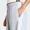 Pantalones de paracaídas tejidos estilo de vida Adidas Essentials 3 bandas para mujer-