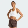 Sujetador de soporte medio con bolsillo para correr Adidas adi365 para mujer-