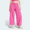 Pantalones de paracaídas tejidos estilo de vida Adidas Essentials 3 bandas para mujer-