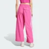 Pantalones de paracaídas tejidos estilo de vida Adidas Essentials 3 bandas para mujer-