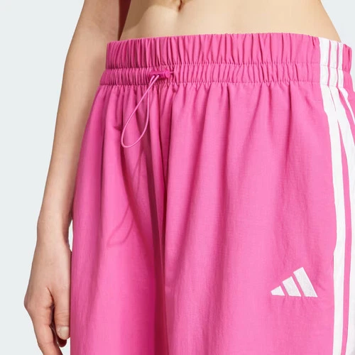 Pantalones de paracaídas tejidos estilo de vida Adidas Essentials 3 bandas para mujer-