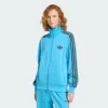 Camiseta deportiva suelta Adidas Firebird para mujer-