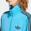 Camiseta deportiva suelta Adidas Firebird para mujer-